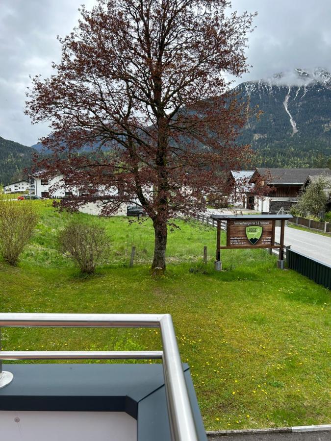 Ferienwohnungen Lodge-B Weissenbach am Lech Esterno foto